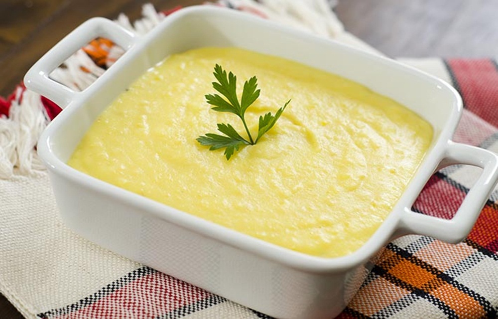 Ir para  <ul>
	<li>5 mandioquinhas;</li>
	<li>1 cenoura;</li>
	<li>1/2 caixa de creme de leite;</li>
	<li>noz-moscada;</li>
	<li>queijo parmes&atilde;o...